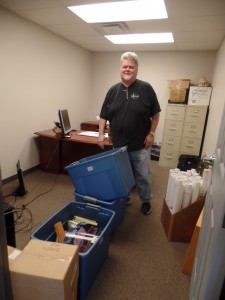 guy moving boxes into office space, office relocation, log homes, log cabin homes, log cabins, post and beam homes, timberframe homes, timber frame homes, laminated logs, engineered logs, floor plan designs, kiln dried logs, Timberhaven local reps, log homes in Pennsylvania, log homes in PA, Timberhaven Log Homes, Timberhaven Log & Timber Homes