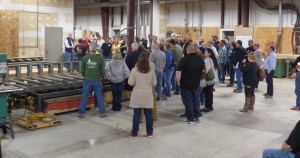 large group gathered to see lamination demonstration, Inaugural seminar, log homes, log cabin homes, log cabins, post and beam homes, timberframe homes, timber frame homes, laminated logs, engineered logs, floor plan designs, kiln dried logs, Timberhaven local reps, log homes in Pennsylvania, log homes in PA, Timberhaven Log Homes, Timberhaven Log & Timber Homes