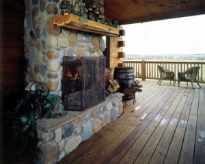 deck with outdoor fireplace, Outdoor entertainment areas, log homes, log cabin homes, log cabins, post and beam homes, timberframe homes, timber frame homes, laminated logs, engineered logs, floor plan designs, kiln dried logs, Timberhaven local reps, log homes in Pennsylvania, log homes in PA, Timberhaven Log Homes, Timberhaven Log & Timber Homes