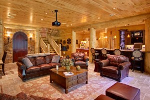 leather furniture in home theater room, Indoor entertainment areas, log homes, log cabin homes, log cabins, post and beam homes, timberframe homes, timber frame homes, laminated logs, engineered logs, floor plan designs, kiln dried logs, Timberhaven local reps, log homes in Pennsylvania, log homes in PA, Timberhaven Log Homes, Timberhaven Log & Timber Homes