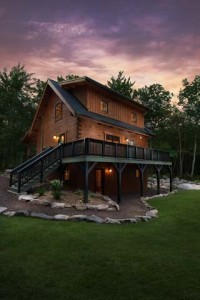 log cabin homes tour, rear of log home at dusk, log homes, log cabin homes, log cabins, post and beam homes, timberframe homes, timber frame homes, laminated logs, engineered logs, floor plan designs, kiln dried logs, Timberhaven local reps, log homes in Pennsylvania, log homes in PA, Timberhaven Log Homes, Timberhaven Log & Timber Homes