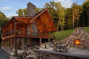 log cabin with huge fireplace and outdoor fire pit, cabin living, log homes, log cabin homes, log cabins, post and beam homes, timberframe homes, timber frame homes, laminated logs, engineered logs, floor plan designs, kiln dried logs, Timberhaven local reps, log homes in Pennsylvania, log homes in PA, Timberhaven Log Homes, Timberhaven Log & Timber Homes