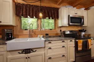 glazed kitchen cabinets in log home, dream home budget, log homes, log cabin homes, log cabins, post and beam homes, timberframe homes, timber frame homes, laminated logs, engineered logs, floor plan designs, kiln dried logs, Timberhaven local reps, log homes in Pennsylvania, log homes in PA, Timberhaven Log Homes, Timberhaven Log & Timber Homes