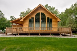 small log home with lots of windows, log home cost, log homes, log cabin homes, log cabins, post and beam homes, timberframe homes, timber frame homes, laminated logs, engineered logs, floor plan designs, kiln dried logs, Timberhaven local reps, log homes in Pennsylvania, log homes in PA, Timberhaven Log Homes, Timberhaven Log & Timber Homes