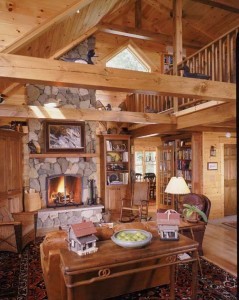 stone fireplace in great room of log home, dream home budget, log homes, log cabin homes, log cabins, post and beam homes, timberframe homes, timber frame homes, laminated logs, engineered logs, floor plan designs, kiln dried logs, Timberhaven local reps, log homes in Pennsylvania, log homes in PA, Timberhaven Log Homes, Timberhaven Log & Timber Homes