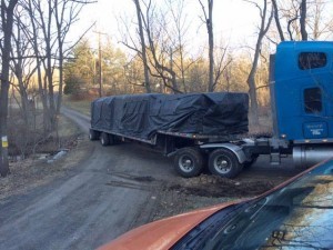 tractor trailer truck carrying packs of logs, log home delivery day, log homes, log cabin homes, log cabins, post and beam homes, timberframe homes, timber frame homes, laminated logs, engineered logs, floor plan designs, kiln dried logs, Timberhaven local reps, log homes in Pennsylvania, log homes in PA, Timberhaven Log Homes, Timberhaven Log & Timber Homes