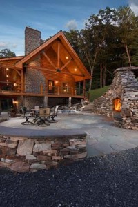 outdoor patio area with fireplace, Best home, log homes, log cabin homes, log cabins, post and beam homes, timberframe homes, timber frame homes, laminated logs, engineered logs, floor plan designs, kiln dried logs, Timberhaven local reps, log homes in Pennsylvania, log homes in PA, Timberhaven Log Homes, Timberhaven Log & Timber Homes