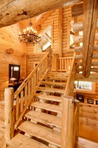 Half log handcrafted stair systems, custom stairs in log home, stair systems, wooden stair systems, custom stair systems, custom stairs, wooden stairs, Timberhaven stair options