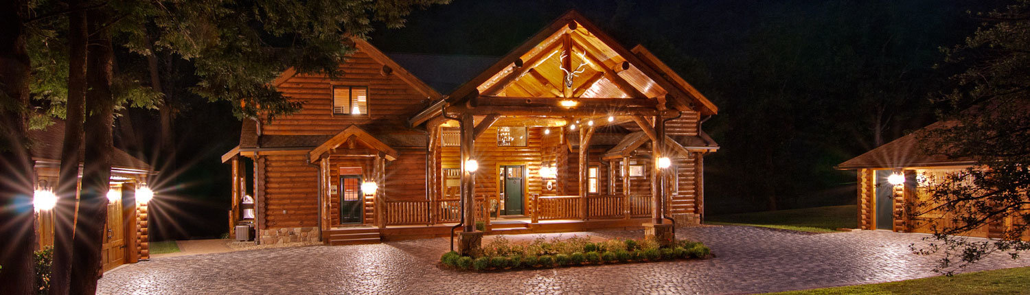 Exterior Log Home at Twilight