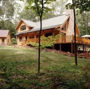 log home with wrap around deck, solid log home, differences, log vs. timber frame homes, different home design options, log homes, log cabin homes, log cabins, post and beam homes, timberframe homes, timber frame homes, laminated logs, engineered logs, floor plan designs, kiln dried logs, log homes in PA, Timberhaven Log Homes, Timberhaven Log & Timber Homes