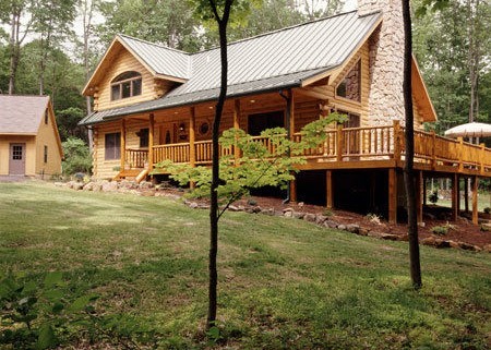 Log Home Adapts To The Setting