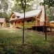 Log Home Adapts To The Setting