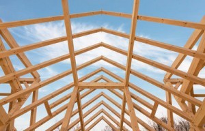 timber frame roof under construction, hurricanes pushing pricing, log homes, log cabins, timber frame homes, laminated logs, engineered logs, floor plan designs, kiln dried logs, log homes in Pennsylvania, Timberhaven Log Homes, Timberhaven Log & Timber Homes