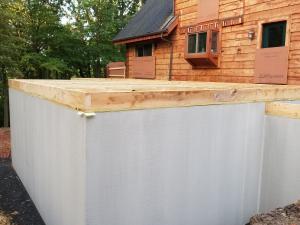 Log Home Addition Foundation Prep, Log Home Addition to Existing Log Home, log home additions, timber frame home additions, Timberhaven, home additions with wood, log homes, Engineered logs