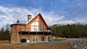 log home in Tennessee, dream log home, customer testimonial, log homes, log cabin homes, log home plans, Timberhaven, kiln dried, engineered logs, modified Aspen Hill