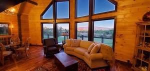 great room with lots of windows, dream log home, customer testimonial, log homes, log cabin homes, log home plans, Timberhaven, kiln dried, engineered logs