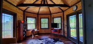 sunroom with lots of windows, dream log home, customer testimonial, log homes, log cabin homes, log home plans, Timberhaven, kiln dried, engineered logs