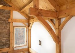 Angle braces in timber frame home
