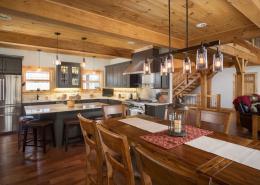 Open timber frame dining and kitchen area