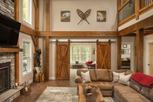 Timberframe frame and barn doors, timber frame home, timber frame living area, timber accents, Timberhaven