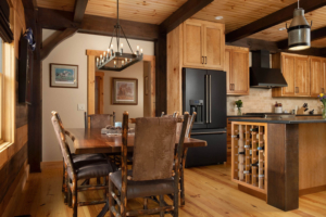 kitchen and dining area of wood home, timber home living, timber home, timber frame home, timber frame, timberhaven, saratoga