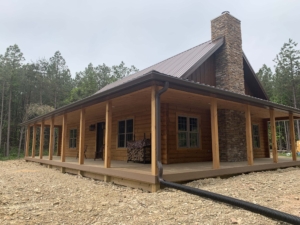 log cabin with wrap around porch, hunting log cabin, Timberhaven