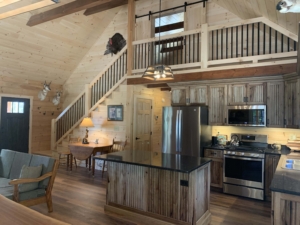 log cabin kitchen with loft, white pine, Timberhaven, hunting cabin