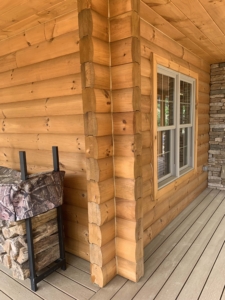 corner of hunting log cabin, corner fillers, log cabin, Timberhaven