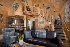 living room with loft in small log cabin, log cabin homes, Timberhaven, log cabin, log home new magazine feature