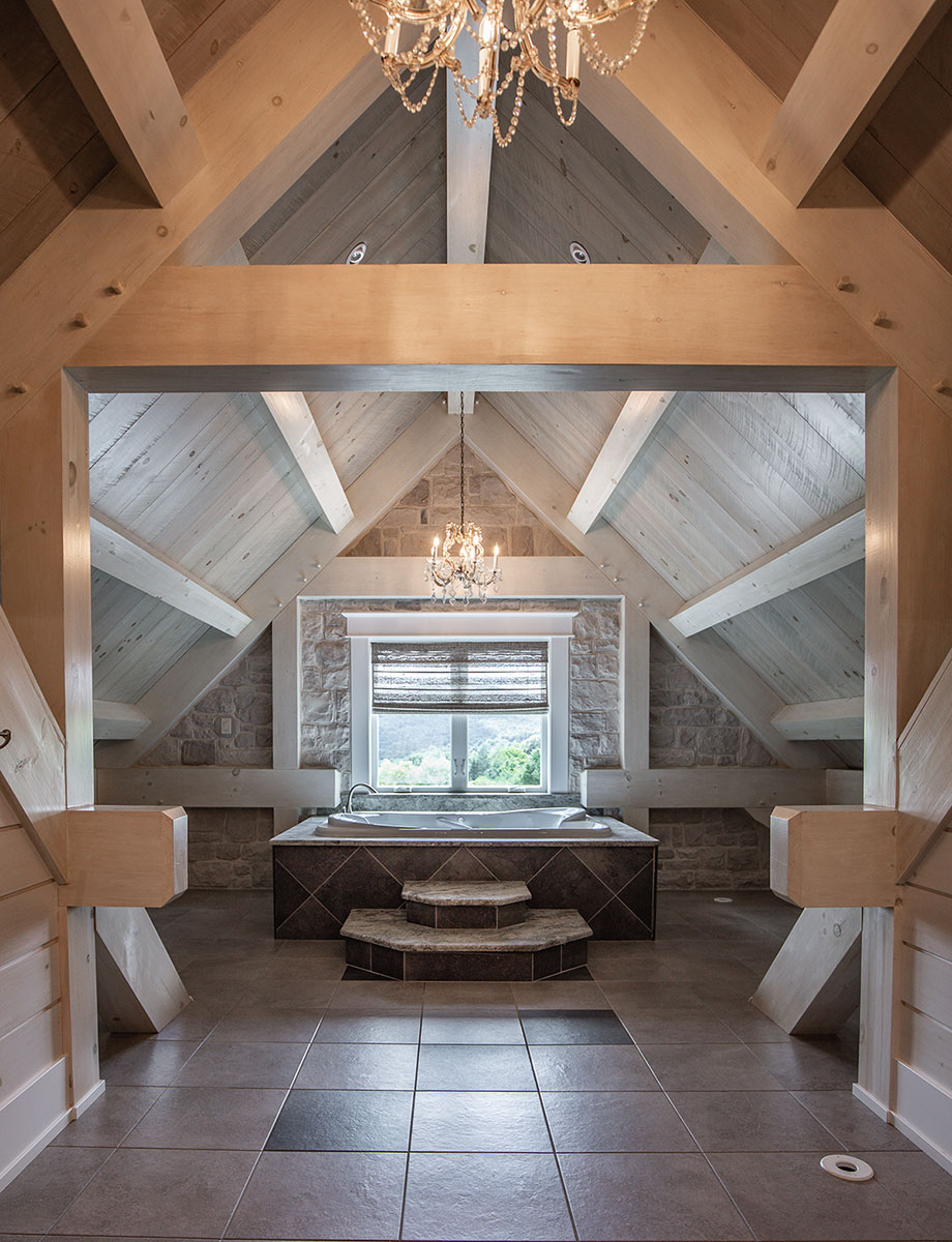 Soaking tub set in a medieval-inspired space