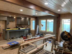 exposed timbers in living area, Timber Frame Model Home Under Construction, Garage Renovation, Timberhaven