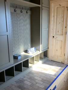 Timber Frame Model Home Under Construction, entryway, Timberhaven, brick flooring