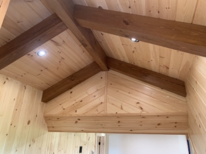 Timber Frame Model Home Under Construction, tongue and groove detail, Timberhaven, exposed timbers