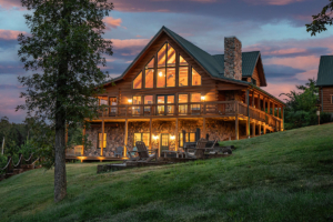 Log Home in the golden hour, Timberhaven, log homes, magazine article, Lost & Found, Lewis Log Home