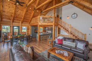 open living area in log home, Timberhaven, log homes, magazine article, Lost & Found, Lewis Log Home