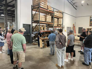 Manufacturing facility being toured by guests, Timberhaven, parade of homes, educational events